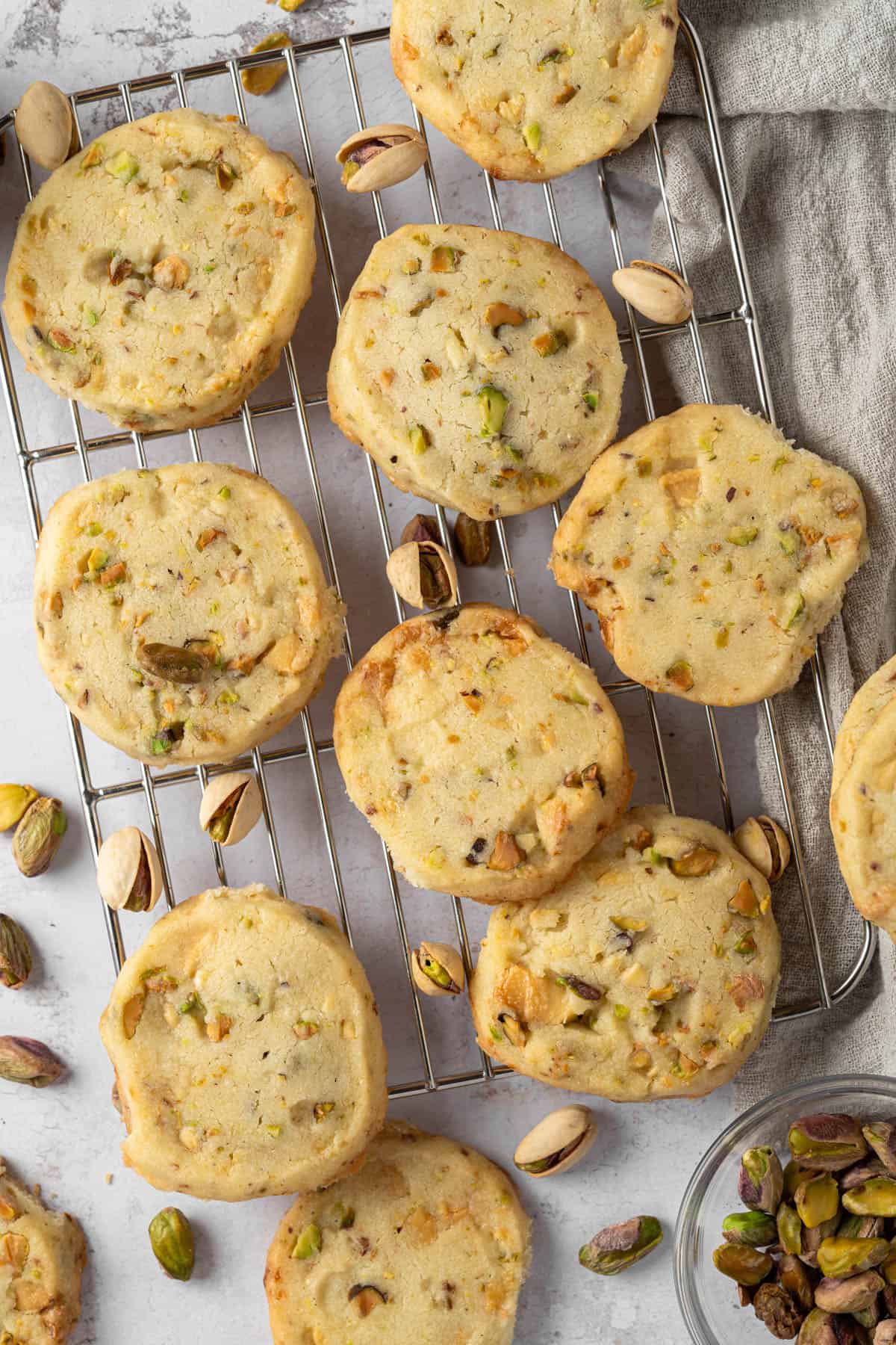 Overhead view of Pistachio Shortbread cookies on a wire rack.