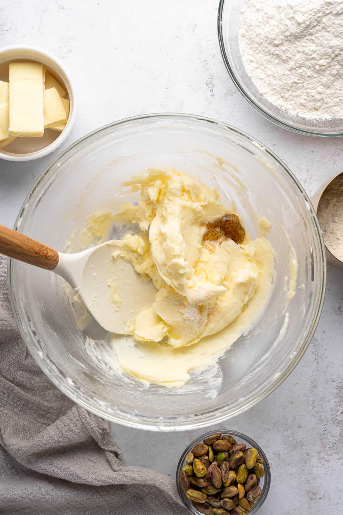 Overhead view of butter sugar mixture in a large bowl.