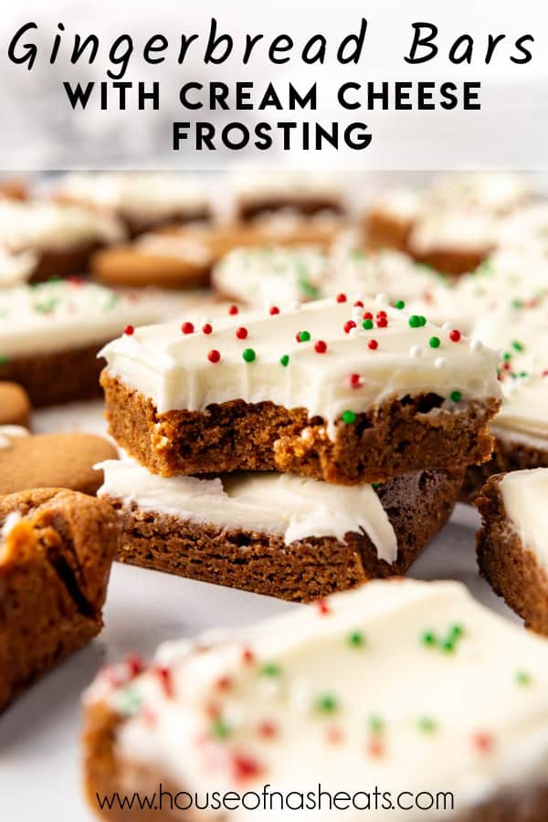 Stacked gingerbread bars with cream cheese frosting with text overlay.