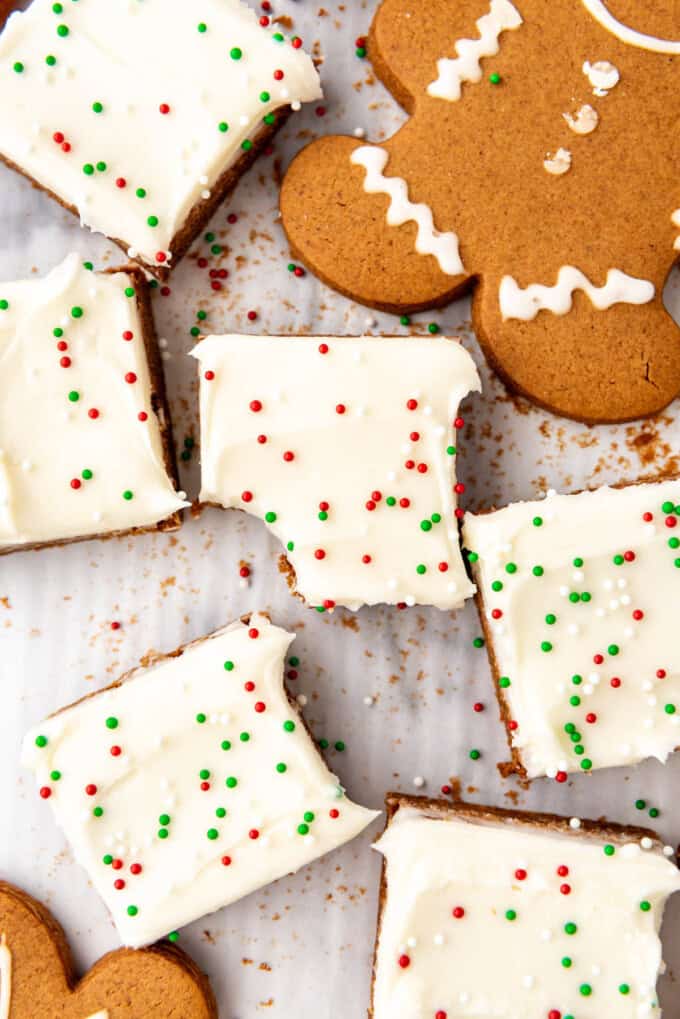 A close overhead image of a gingerbread bar with a bite taken out of it.