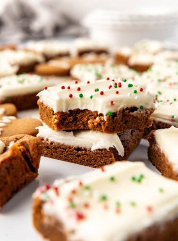 Stacked gingerbread bars with cream cheese frosting.