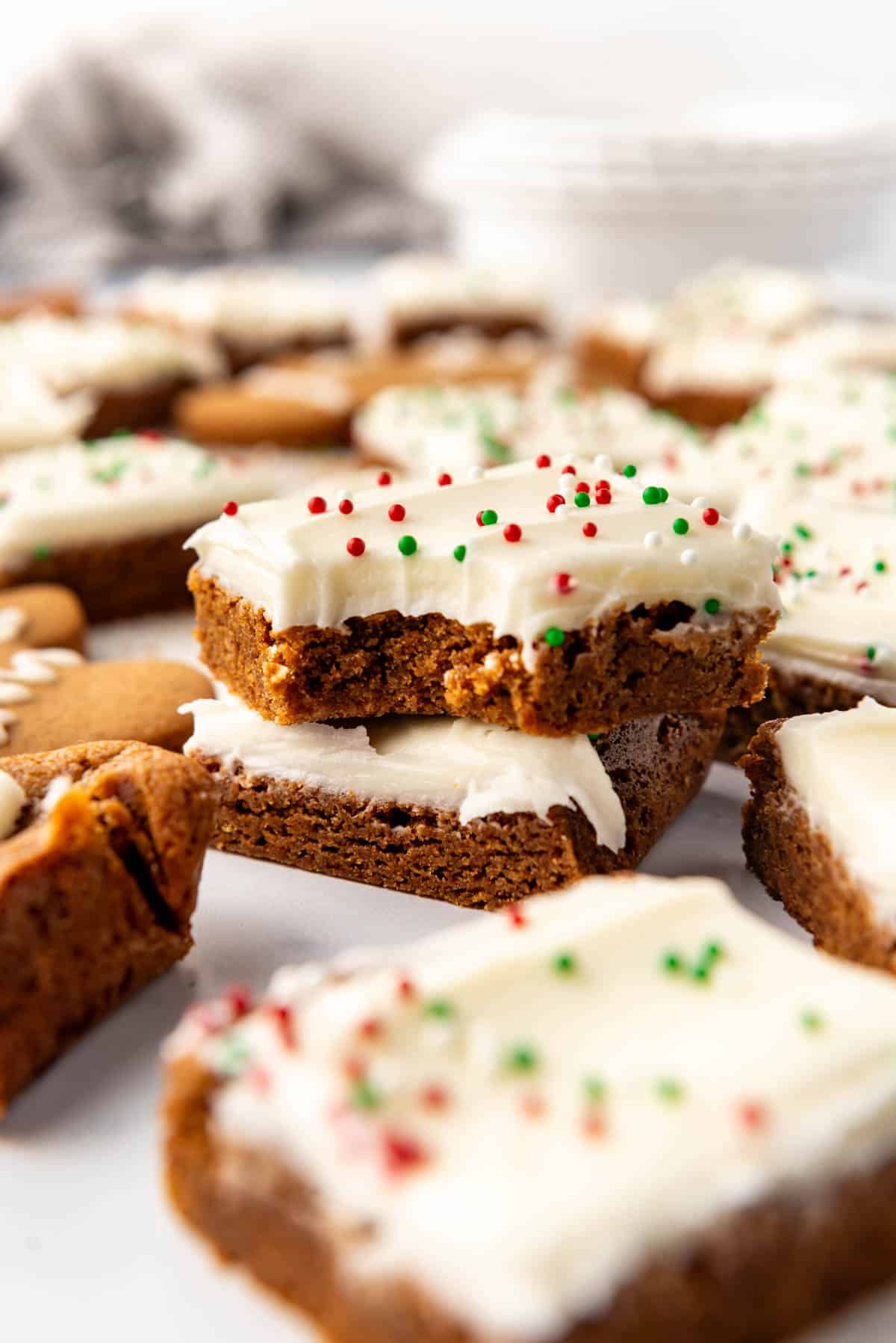 Stacked gingerbread bars with cream cheese frosting.