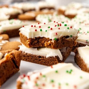 Stacked gingerbread bars with cream cheese frosting.