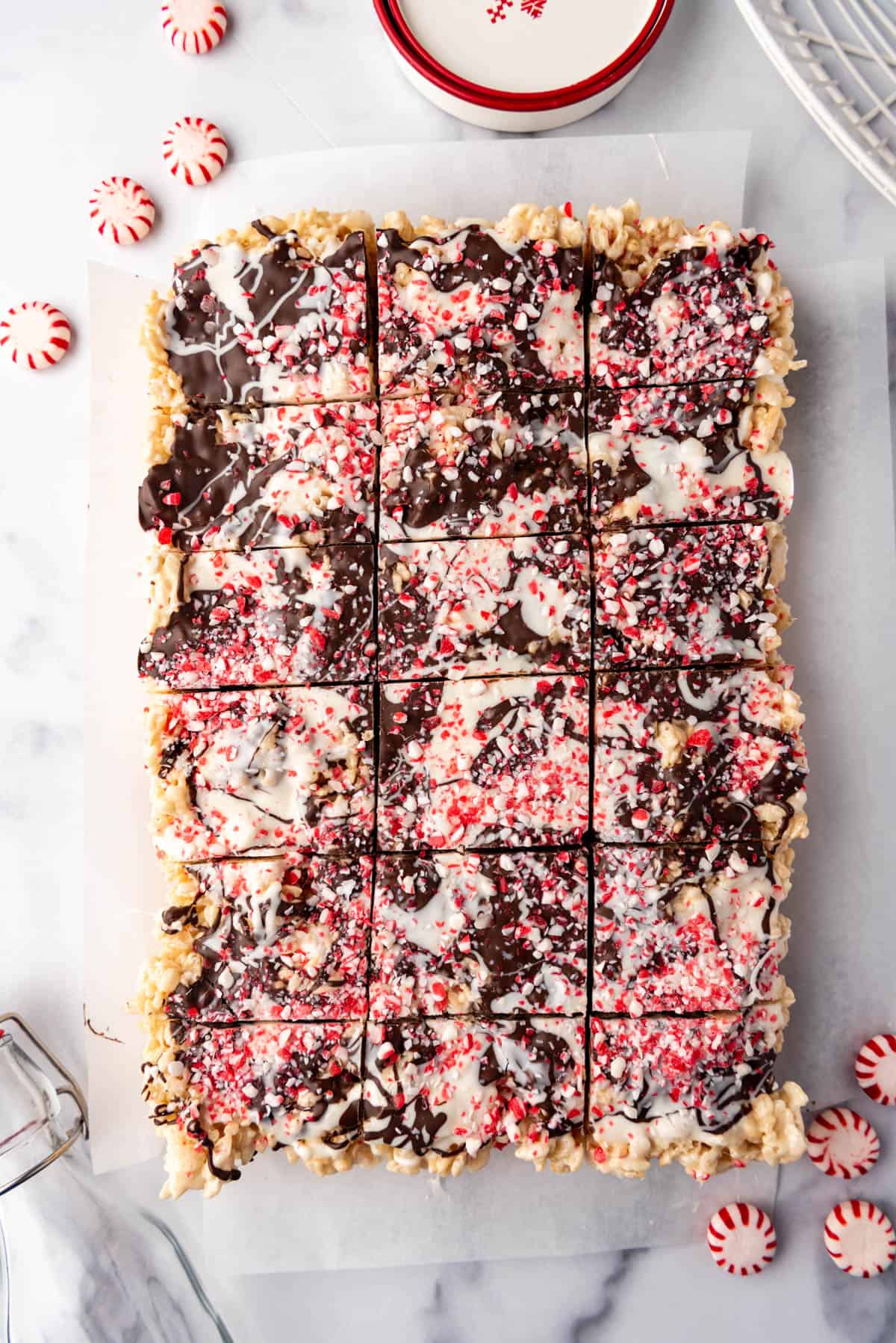 Peppermint bark rice krispies treats cut into squares.