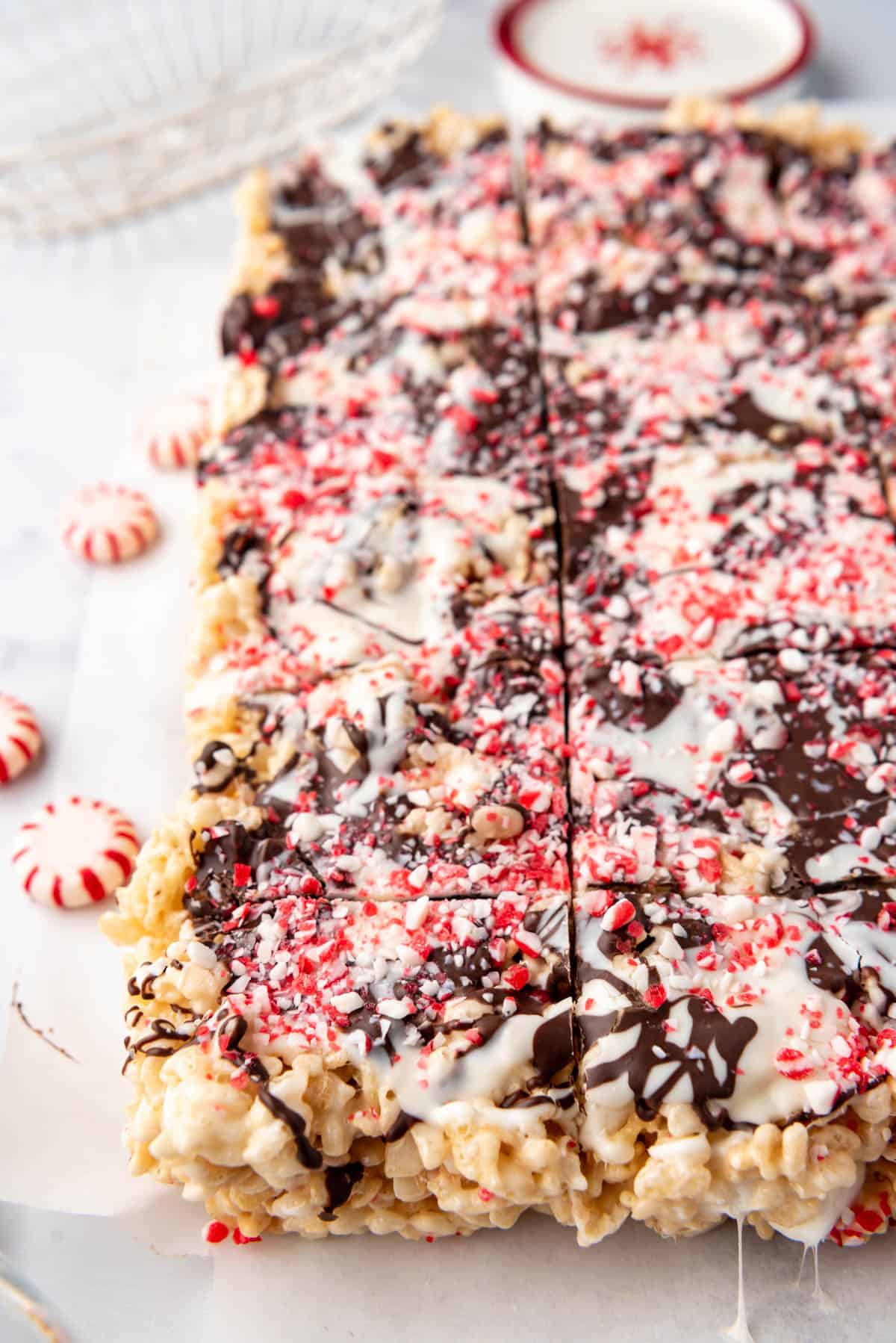 A side view of peppermint bark rice krispies treats.