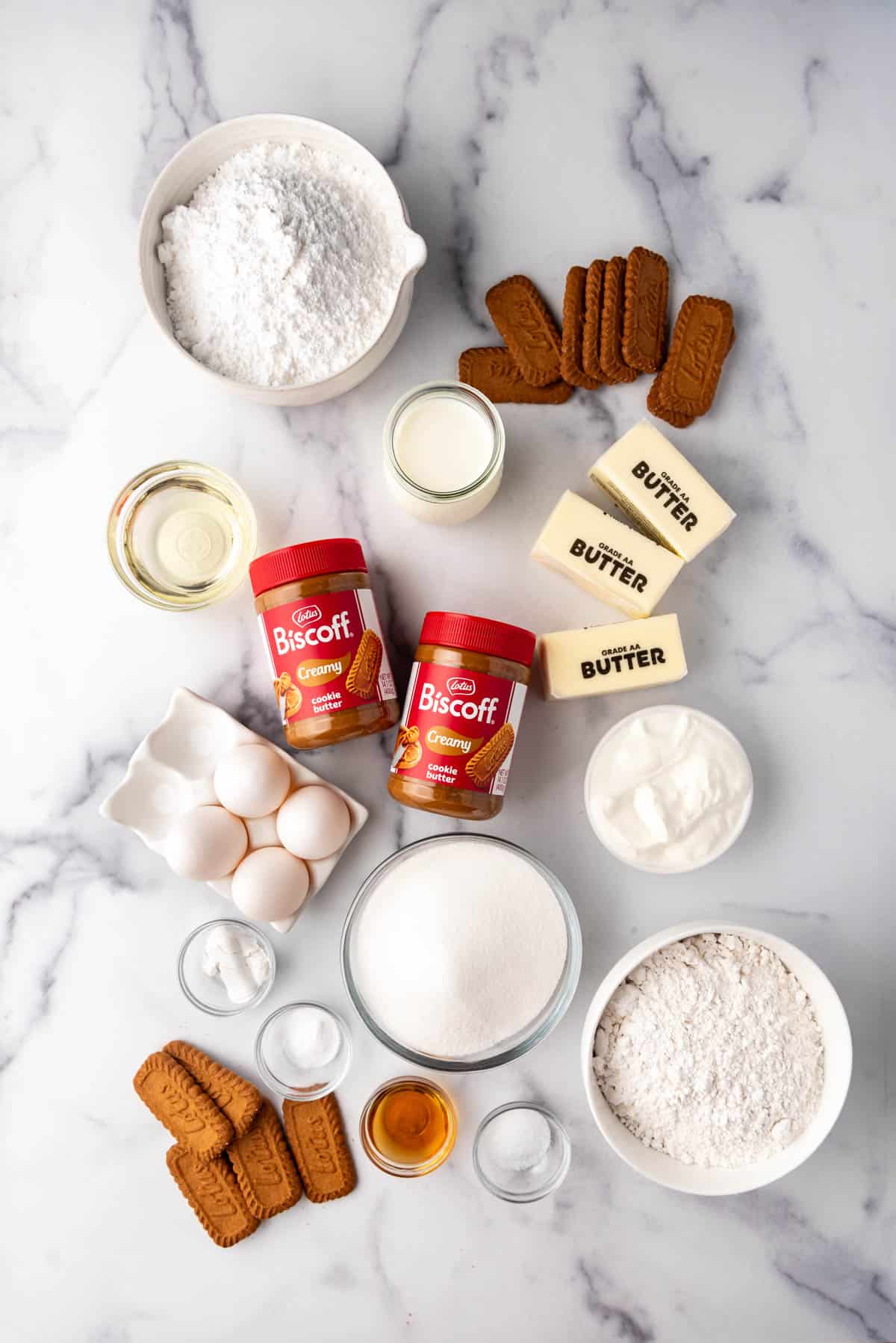 Ingredients for making a biscoff cookie butter cake.