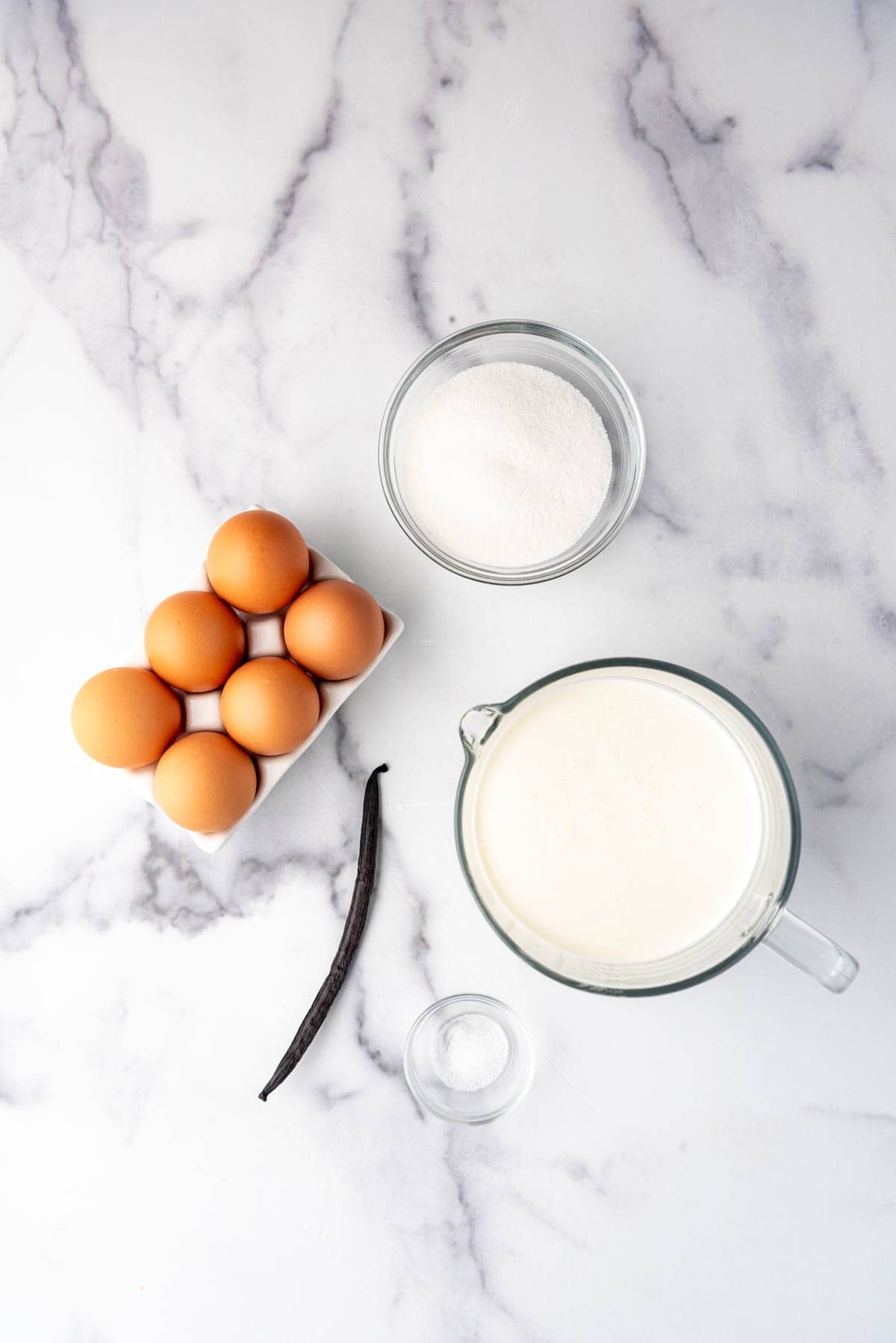 Ingredients for making homemade creme brulee.