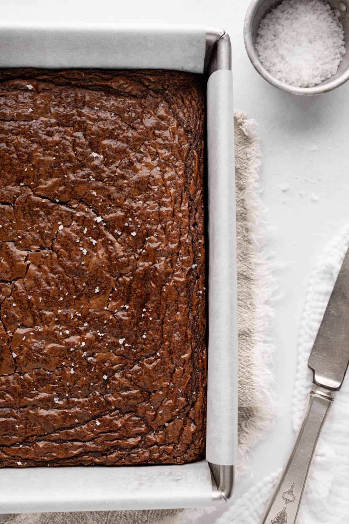 Unsliced brownies cooling in the baking pan.