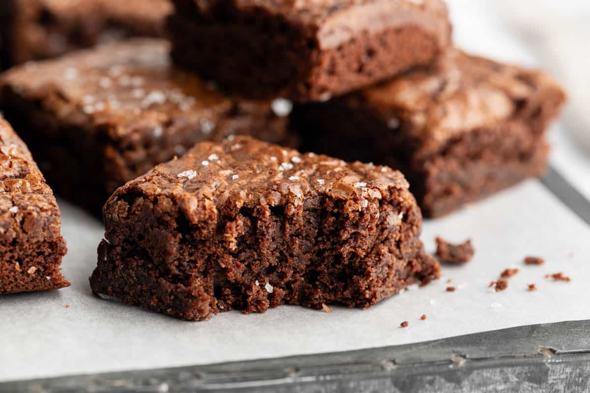 A close up image of a box mix brownie with a bite taken out of it.