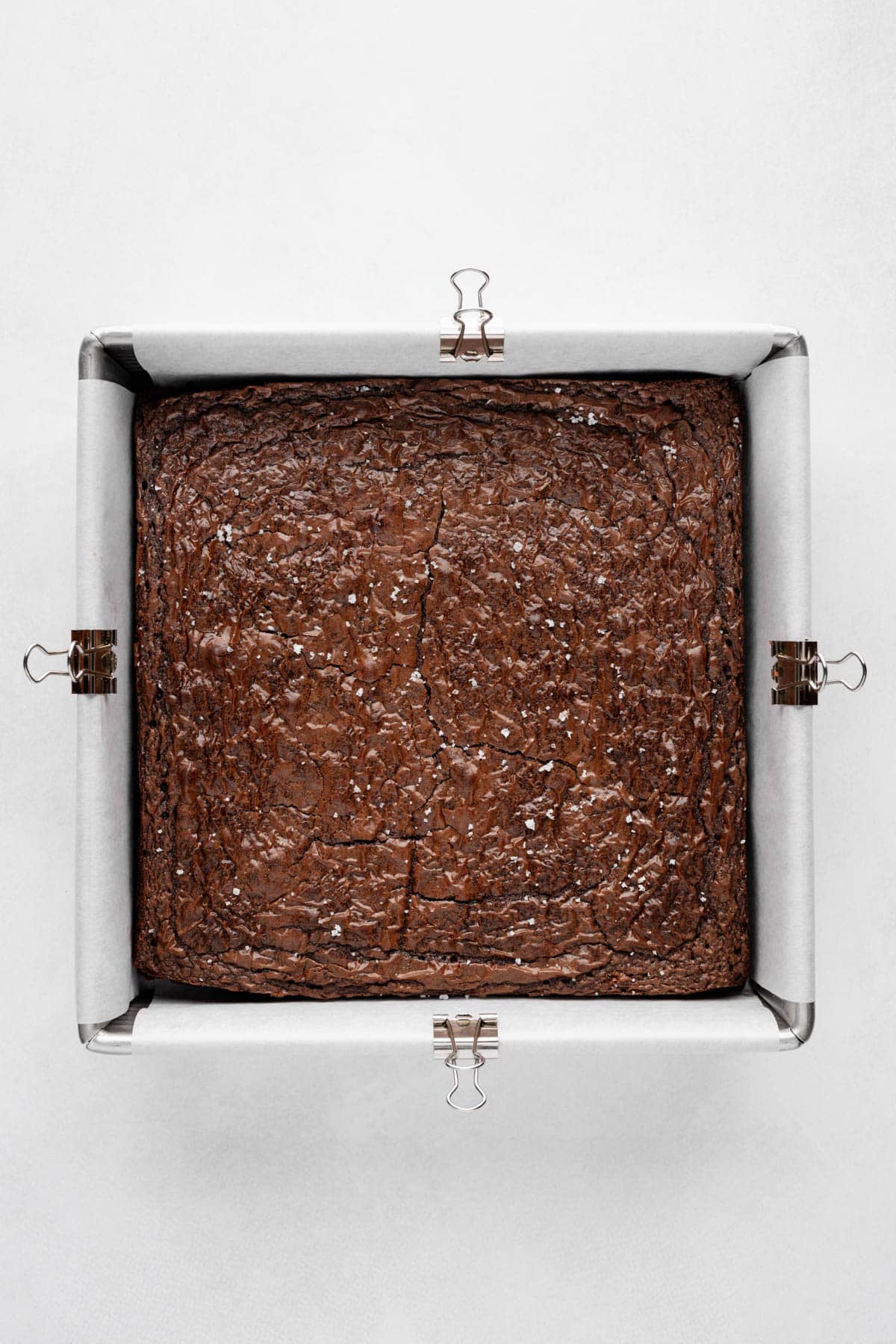 Baked brownies in a square pan.