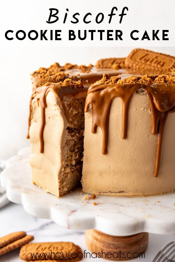 A close image of a Biscoff cake with one slice pulled out with text overlay.