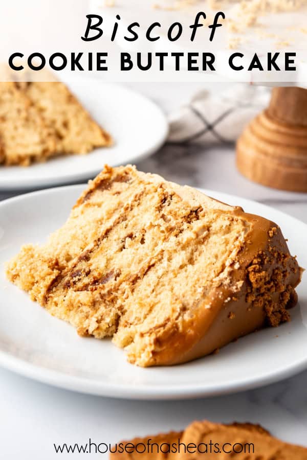 A slice of Biscoff cookie butter cake laying on its side on a white plate with text overlay.