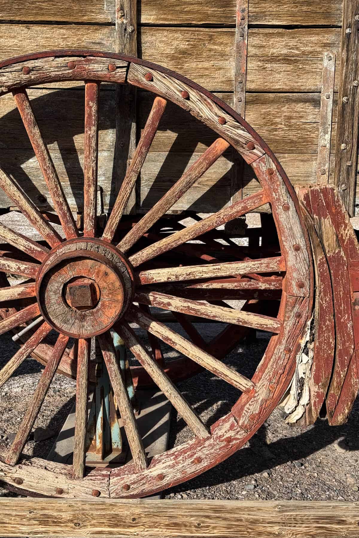 A close up image of a wagon wheel.