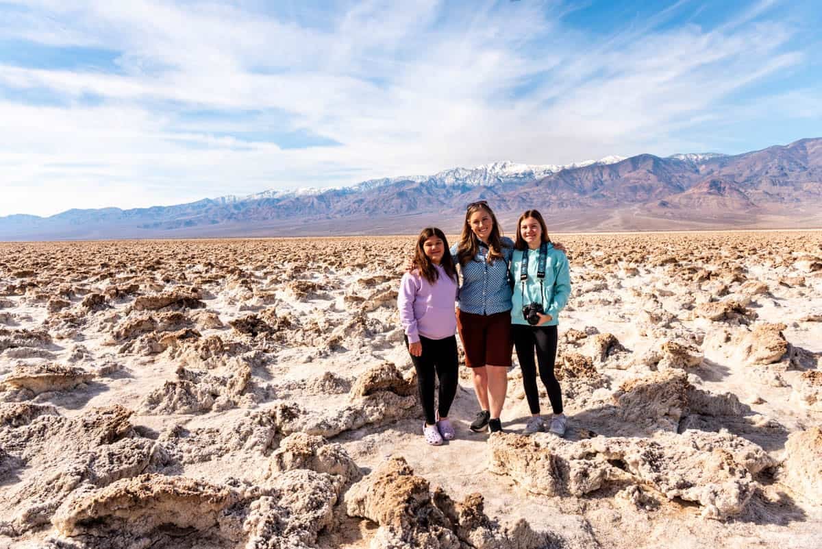 A mom and daughters in Death Valley at the Devil's Golf Course.