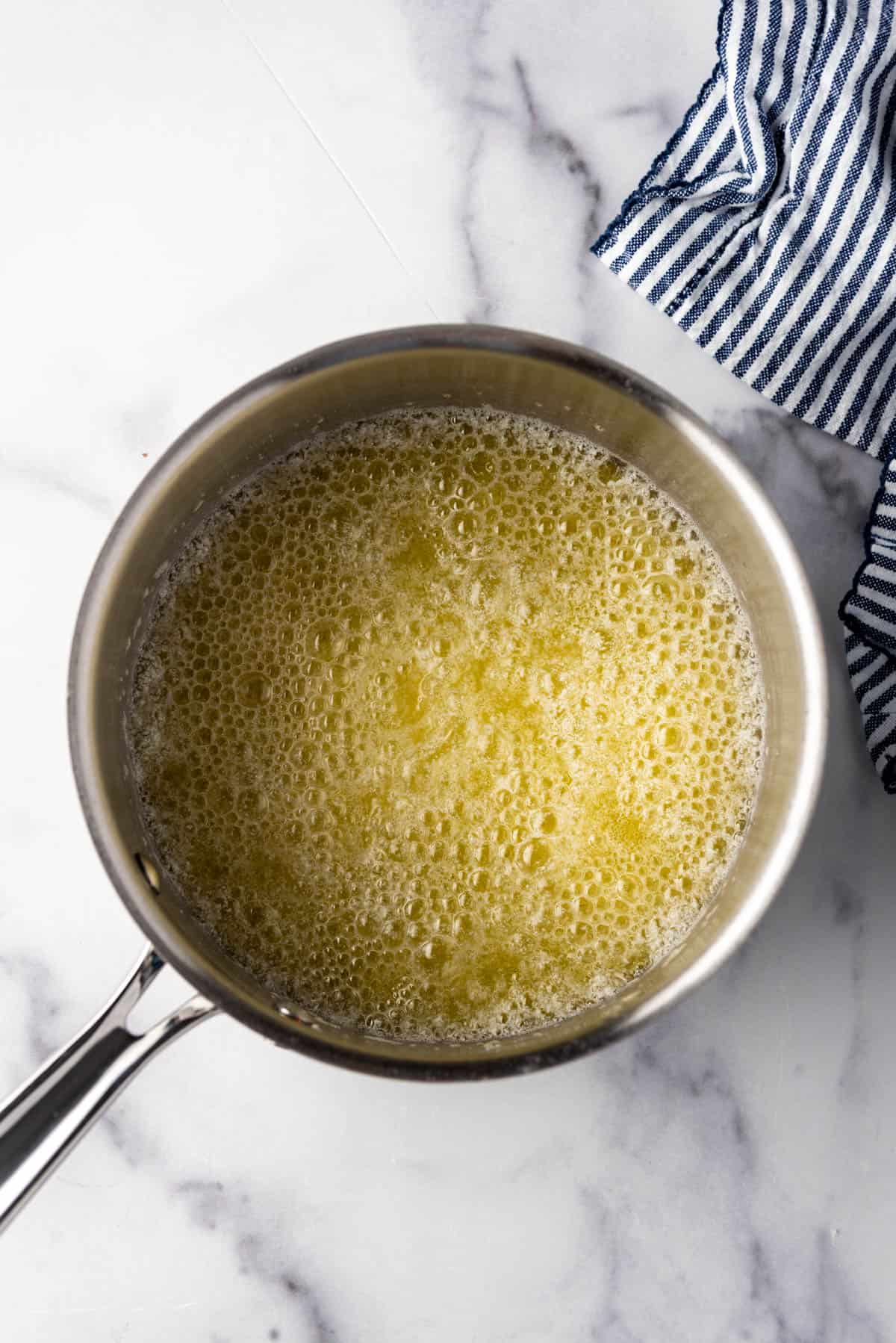 Browning butter in a saucepan.