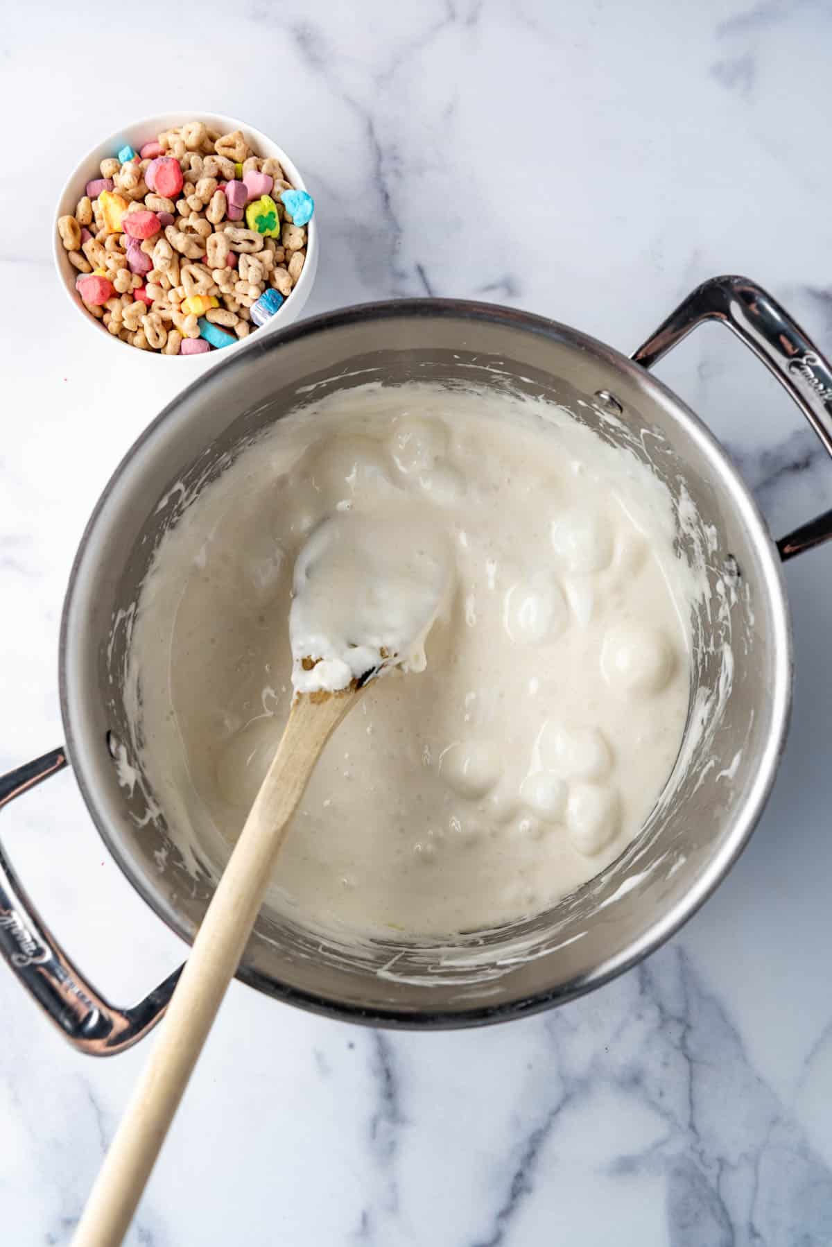 Melted marshmallows and butter in a large pot.