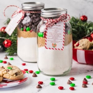An image of two jars of cookie mix with holiday M&M's.