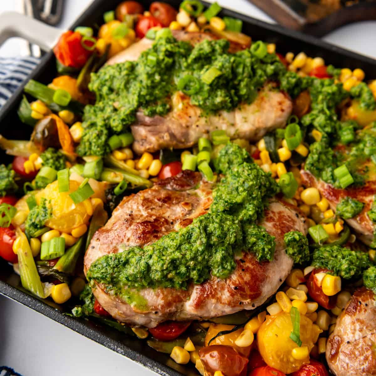 Summer Pork Chops with Tomatoes & Green Herb Sauce