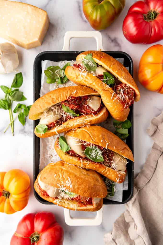 An overhead image of four meatball subs.
