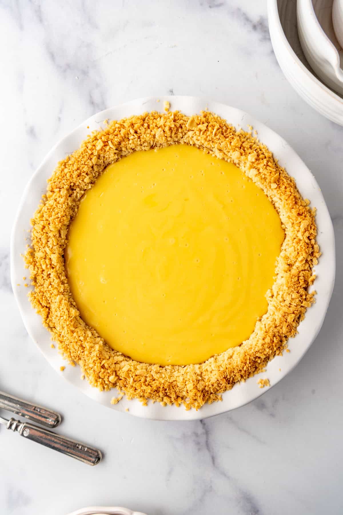 Lemon lemon filling poured into a saltine cracker pie crust. - 6