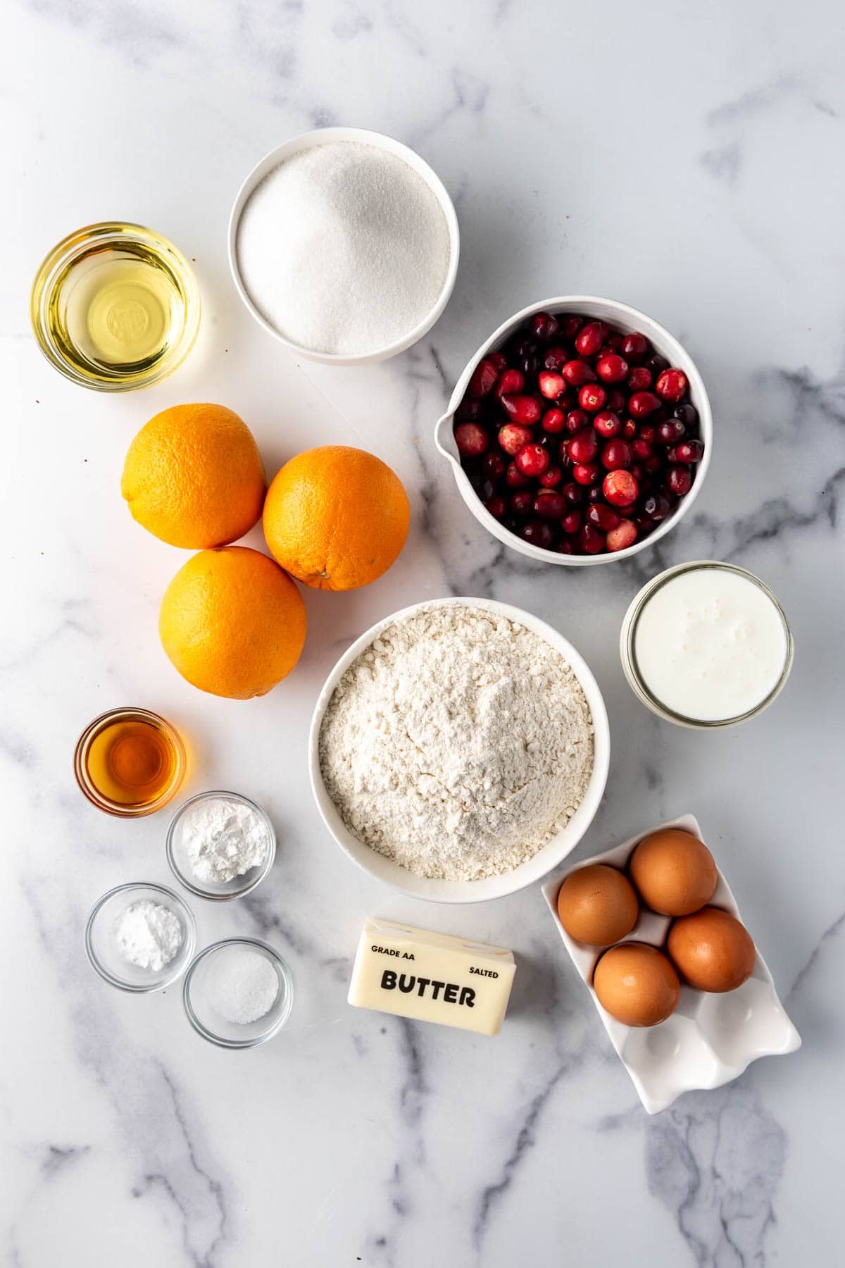 Ingredients for making cranberry orange cake.