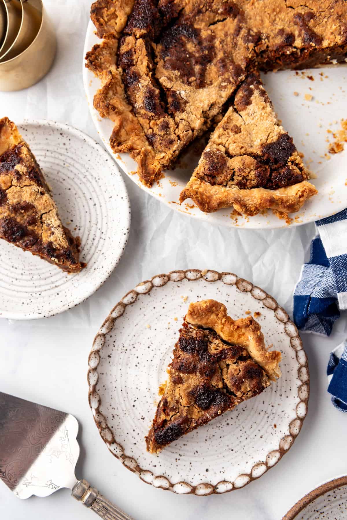 An overhead image of slices of wet bottom shoo fly pie.