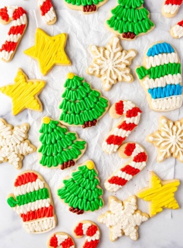 An image of frosted sugar cookies in Christmas shapes.