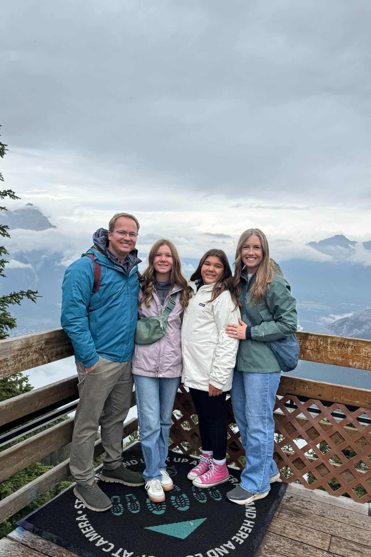 A family of four at the top of the Banff gondola.