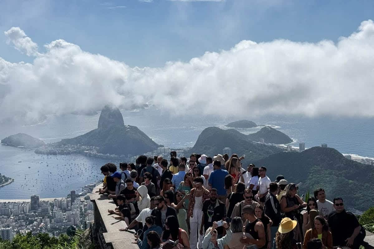 An image of the crowds at the lookout point at the Christ the Redeemer statue in Rio de Janeiro, Brazil.