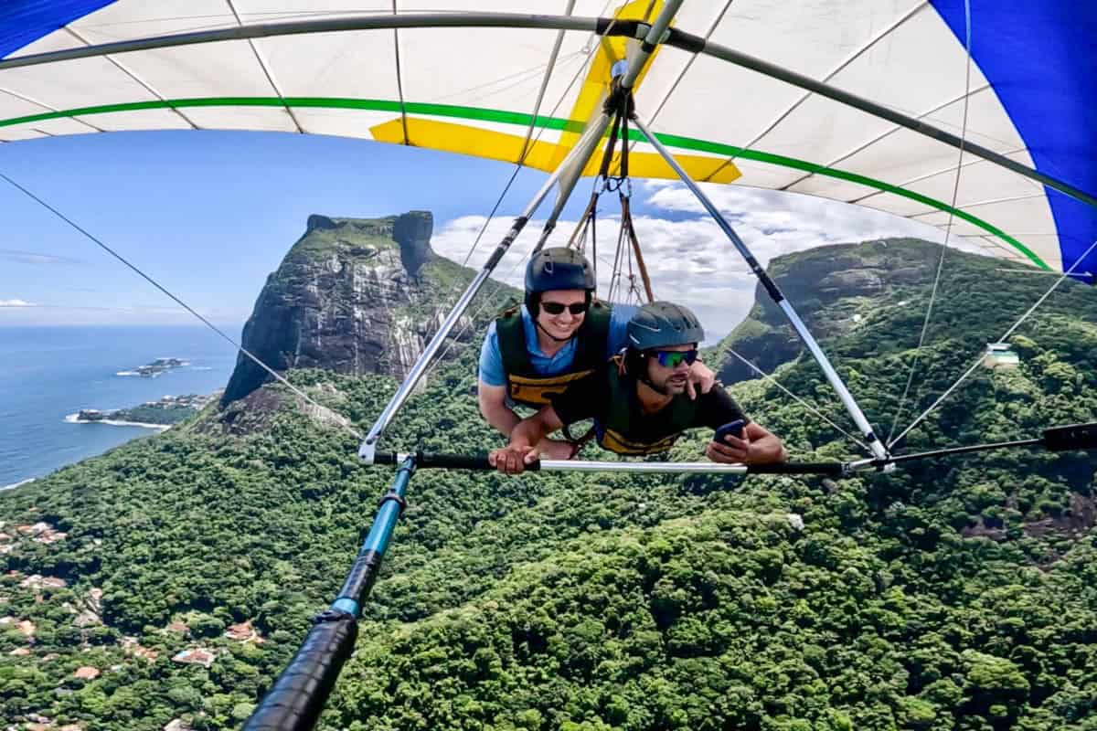 A family in Rio de Janeiro with Sugarloaf Mountain in the background.