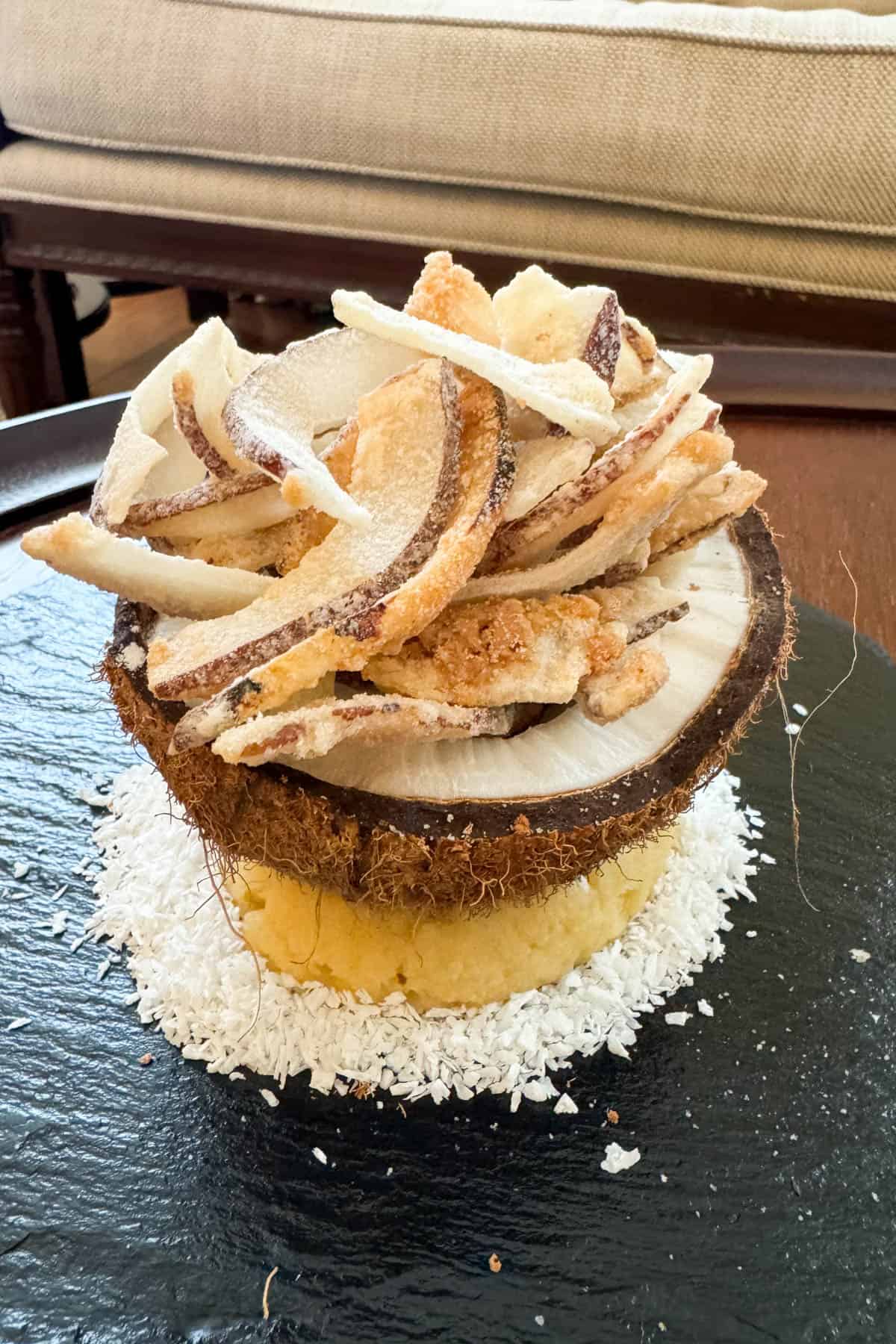 Coconut chips in half a coconut.