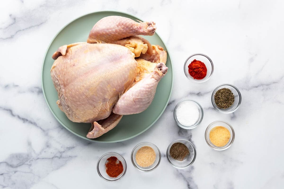 Ingredients for a whole roasted chicken.