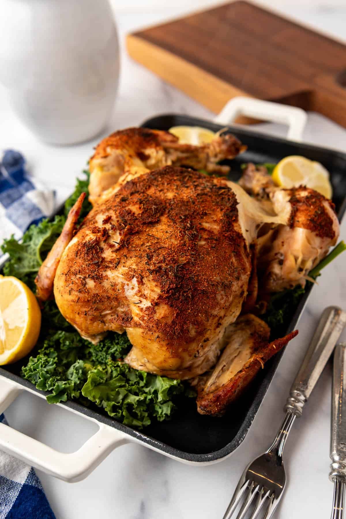 A whole roasted chicken on a platter.