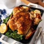 A whole roasted chicken on a platter.