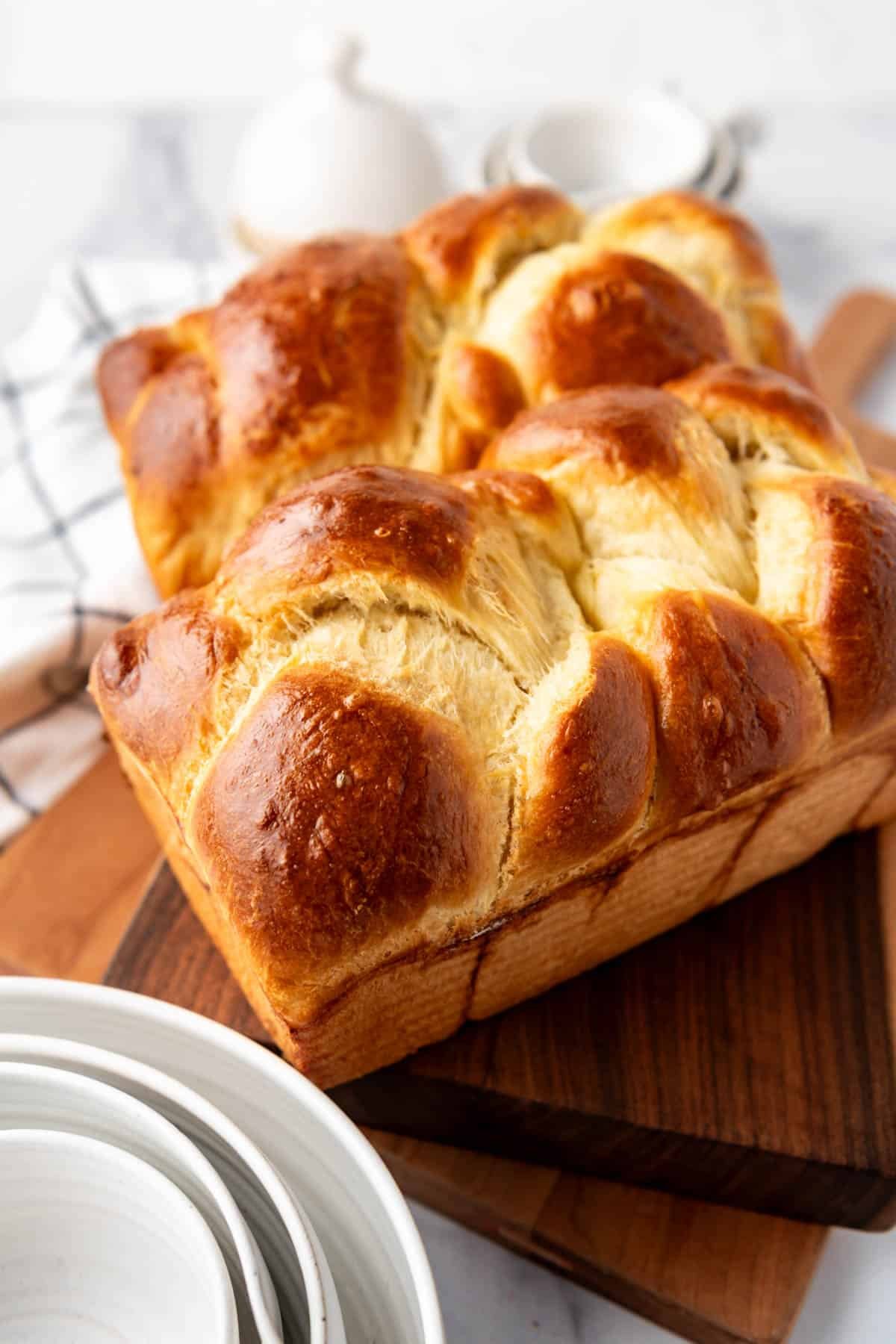 Two braided loaves of brioche bread.
