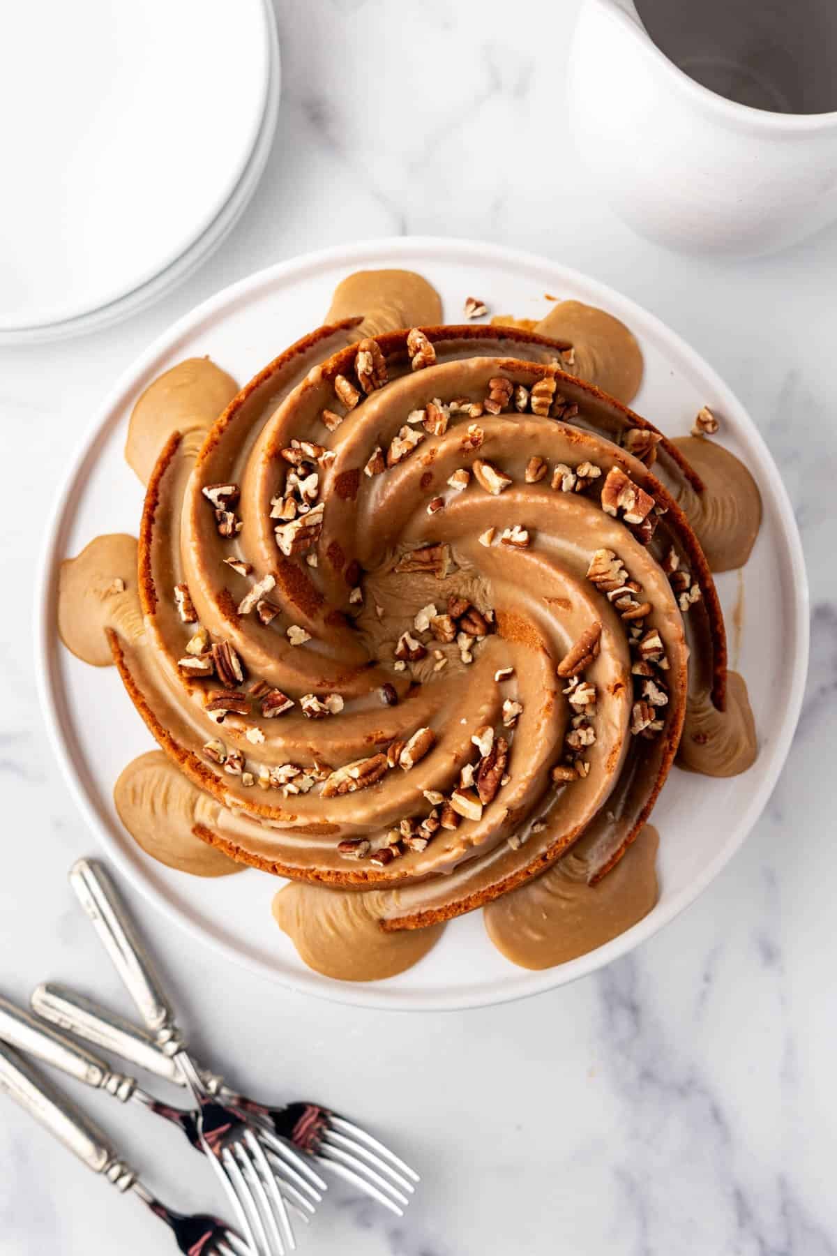 An overhead image of a pecan praline bundt cake.
