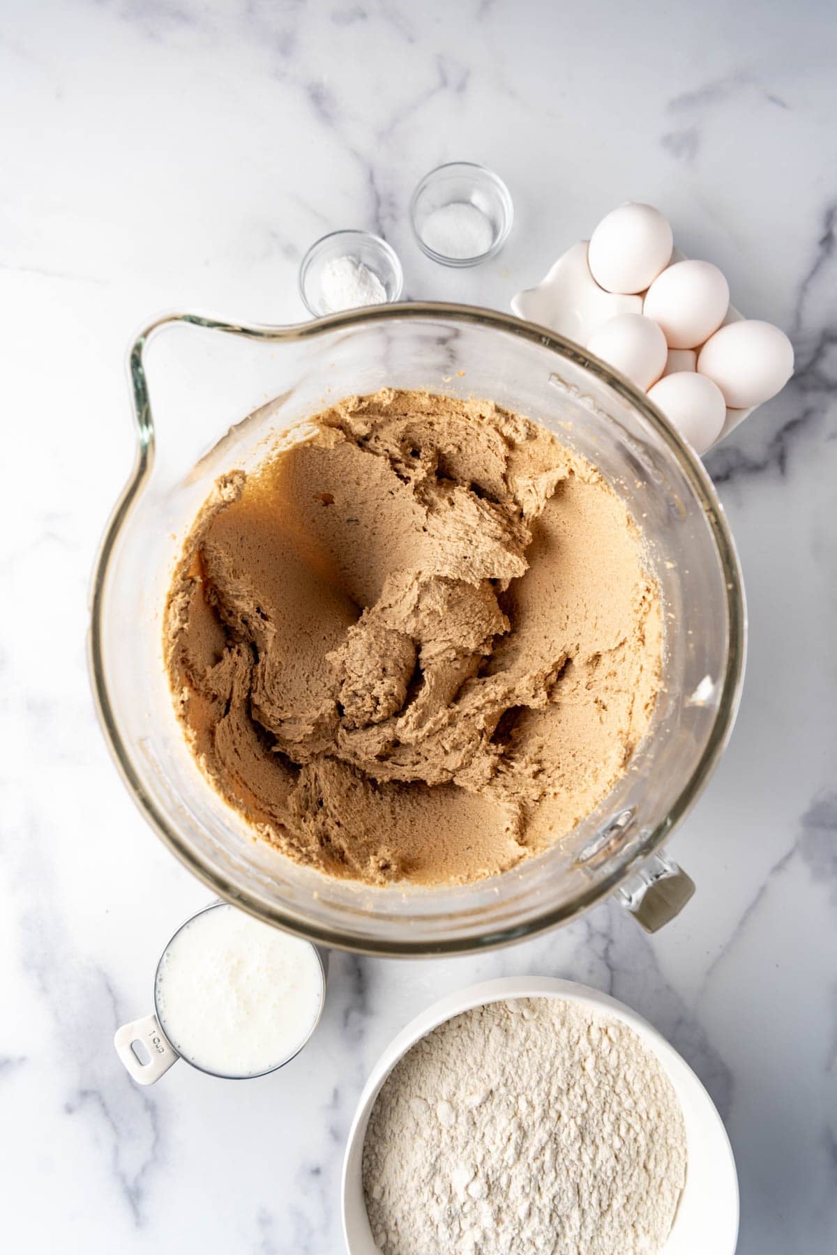 Creamed butter, oil, and brown sugar in a large mixing bowl.