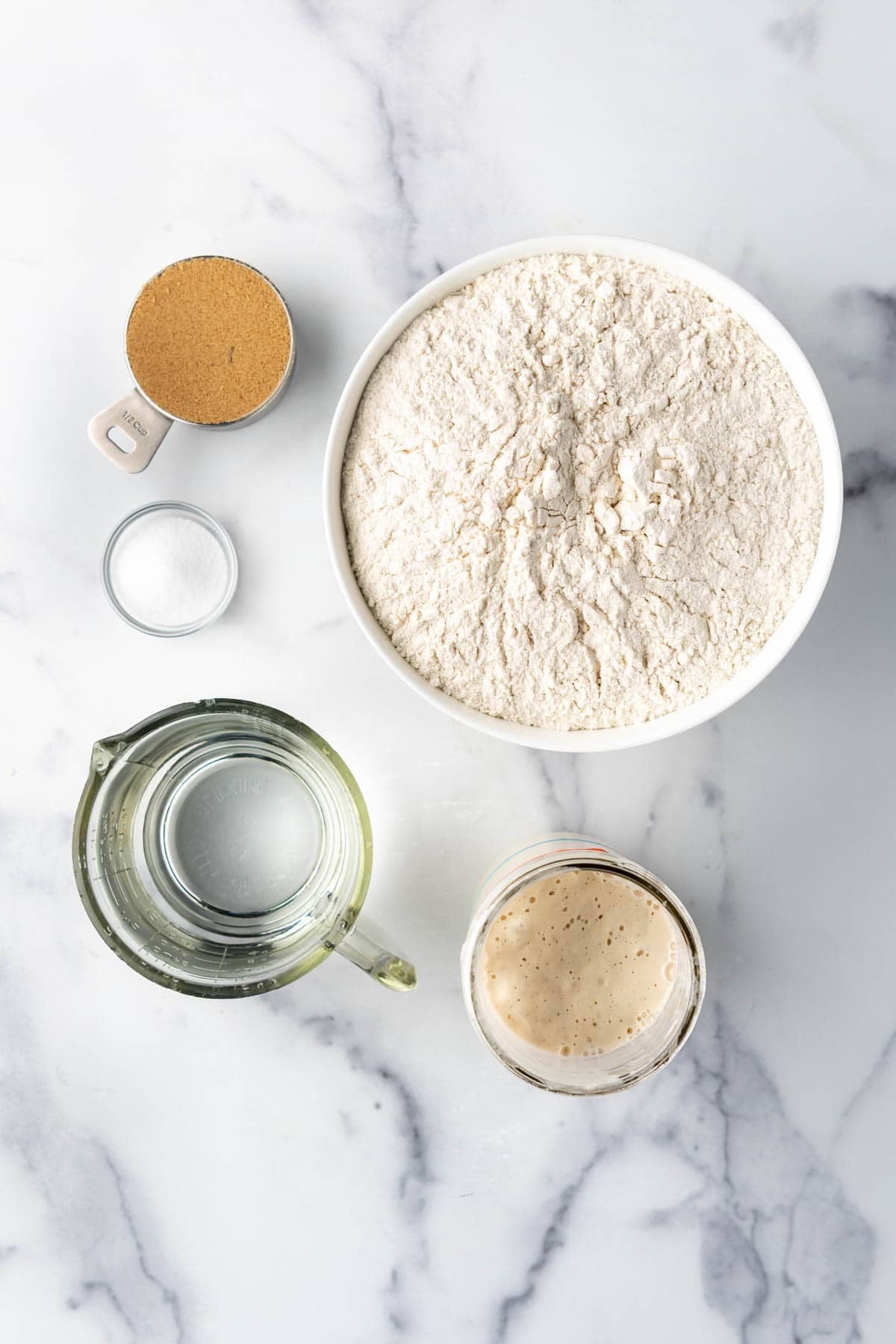 Ingredients for making sourdough bagels.