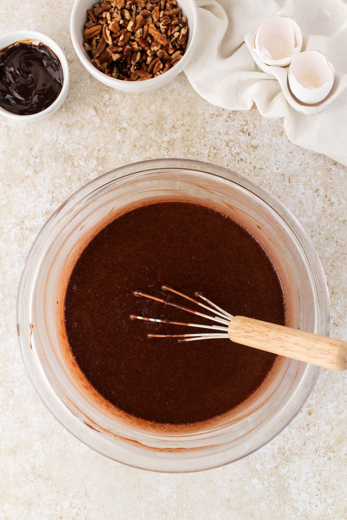 Chocolate cake batter in a bowl.