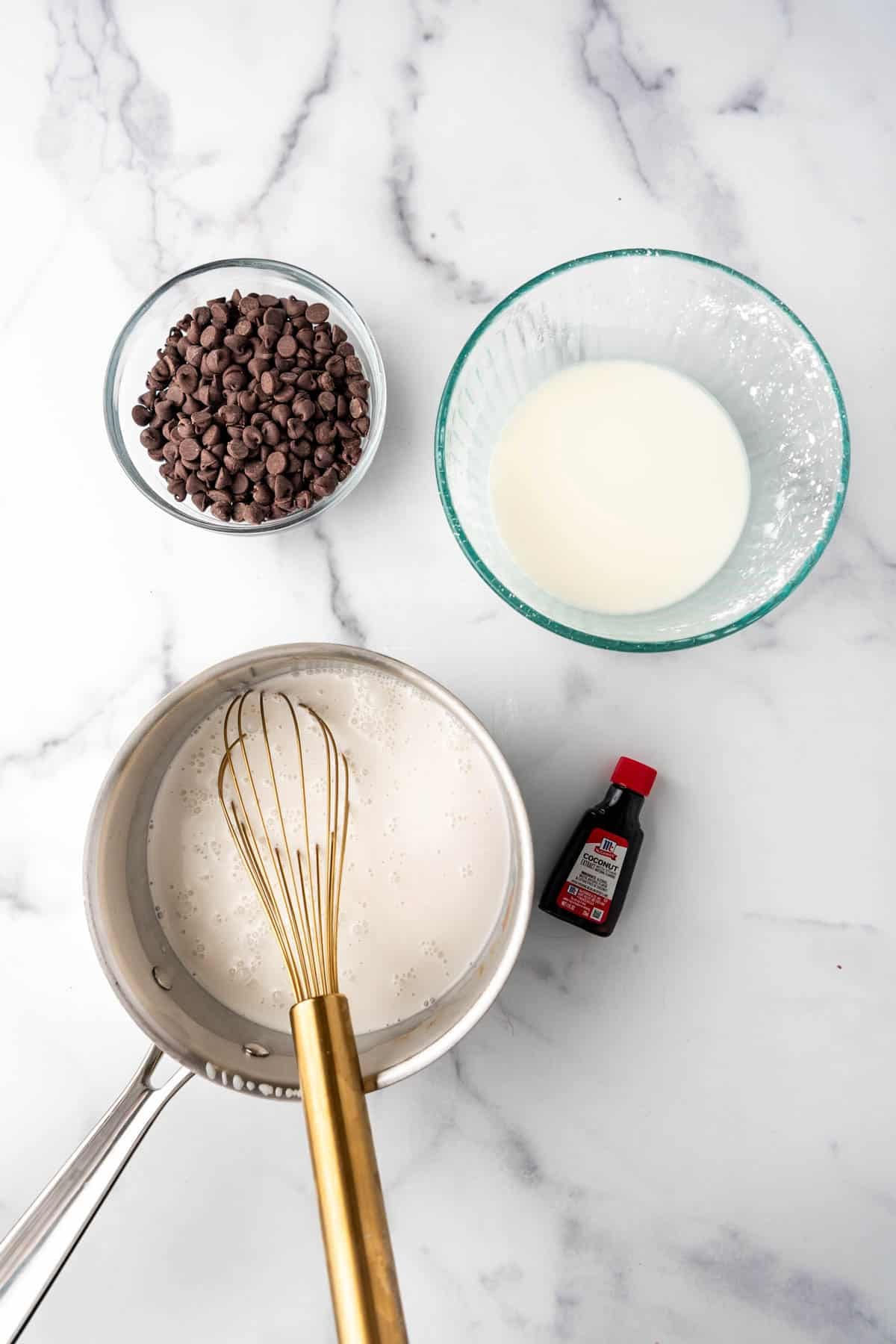 Coconut pudding mixture in a saucepan.