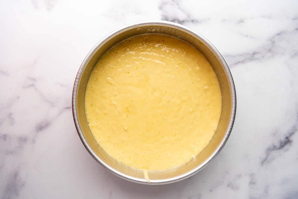 Batter in a cake pan.
