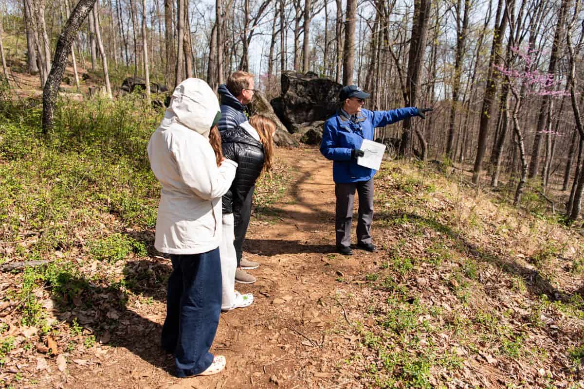An image of a licensed battlefield guide with a family at Gettysburg.