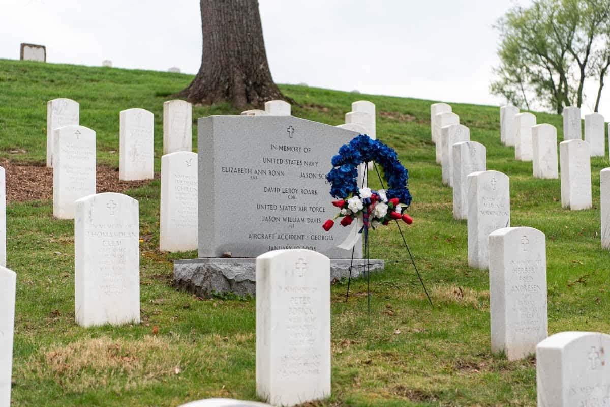 A wreath in front of a grave marker at Arlington National Cemetery.