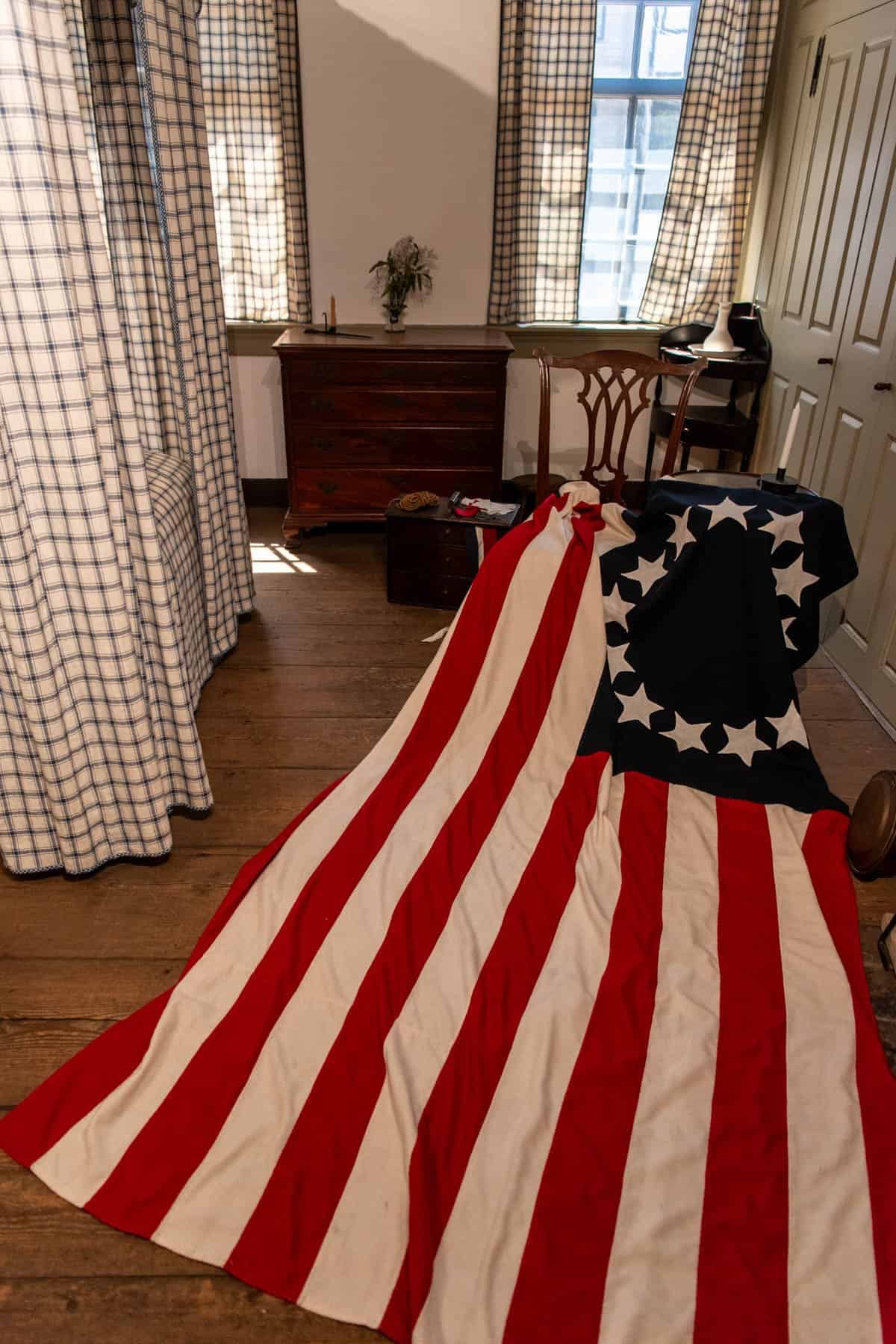 An image of the original flag created by Betsy Ross in the Betsy Ross House in Philadelphia.