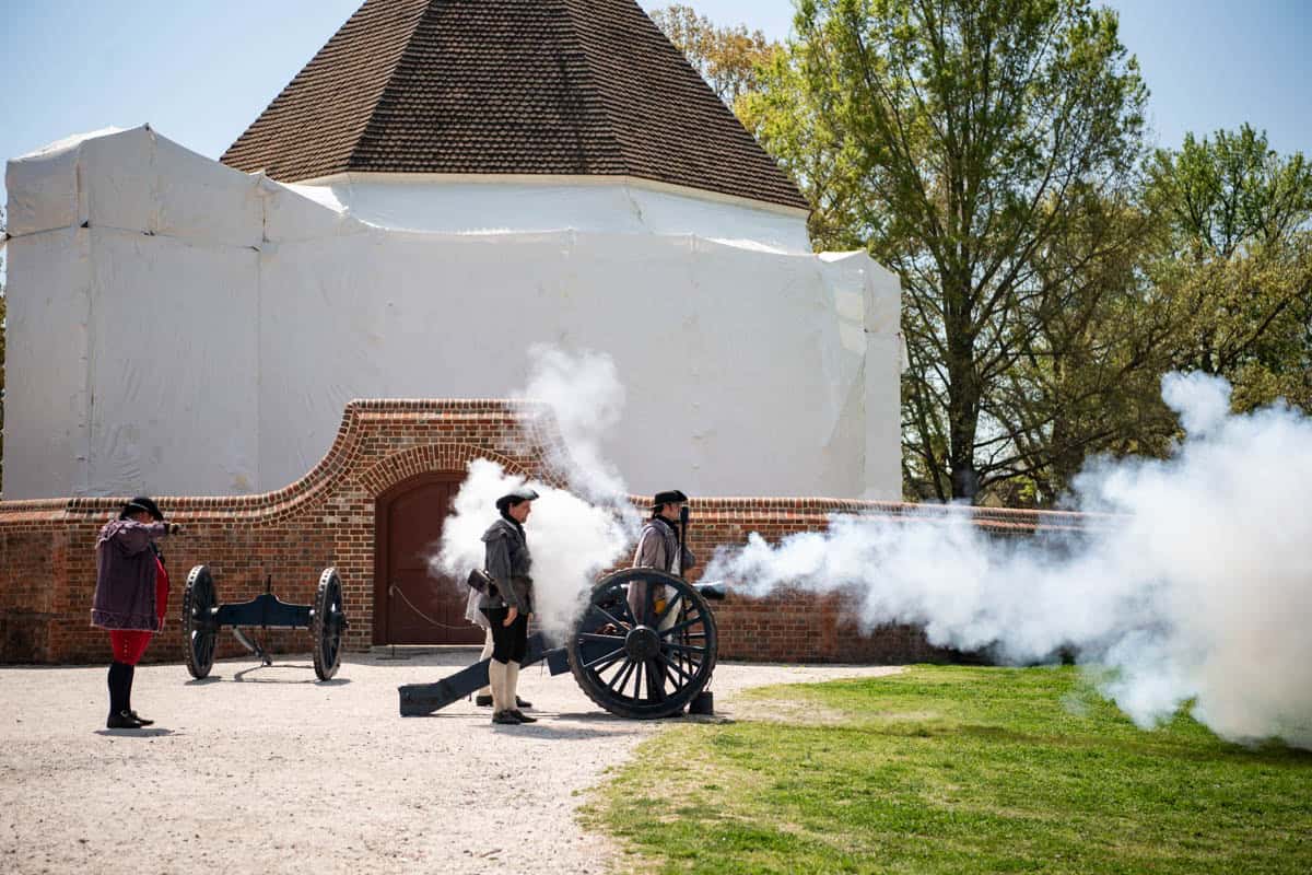 A cannon being fired as a demonstration in Colonial Williamsburg.