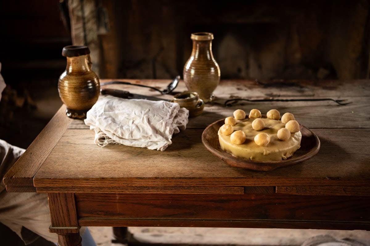 An image of an Easter cake with marzipan balls on a table at the Jamestown Settlement museum.