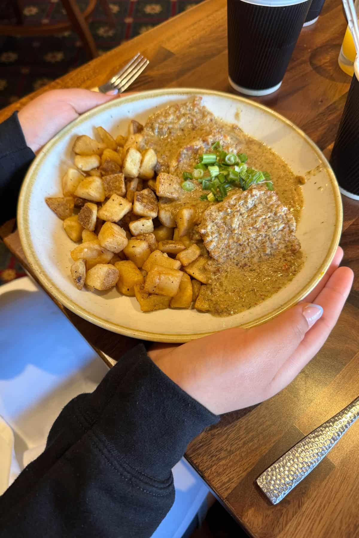 Biscuits and gravy in a bowl.