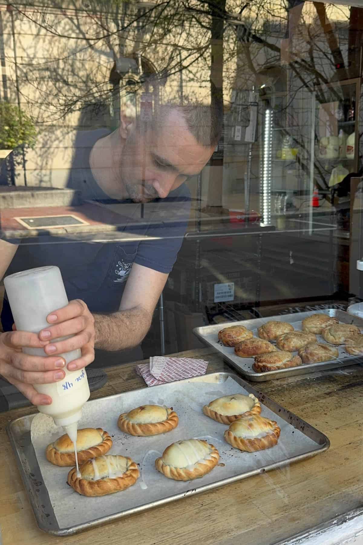 An image of hand pies being decorated.