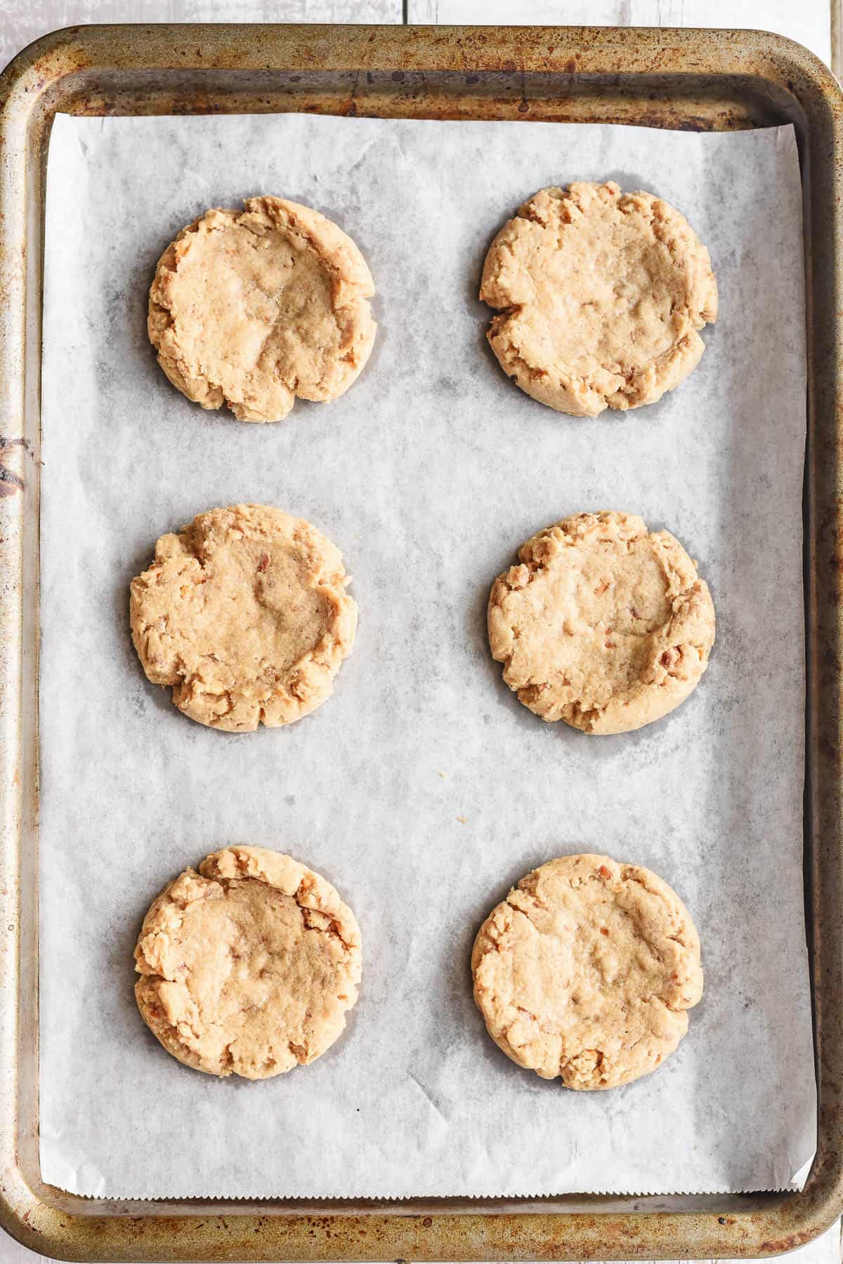 Baked pretzel cookie bases.