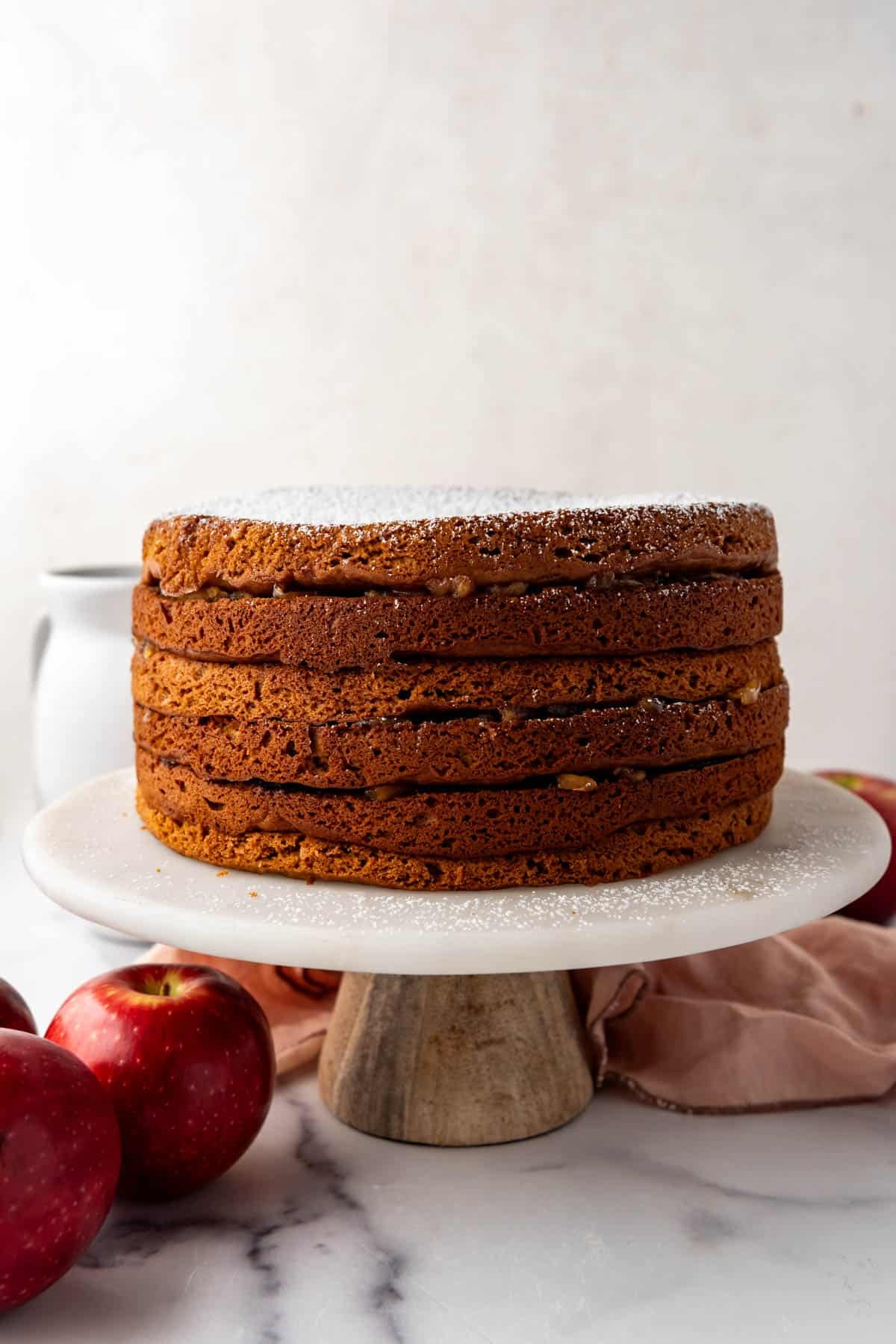 A six layer Applachian apple stack cake on a cake stand.